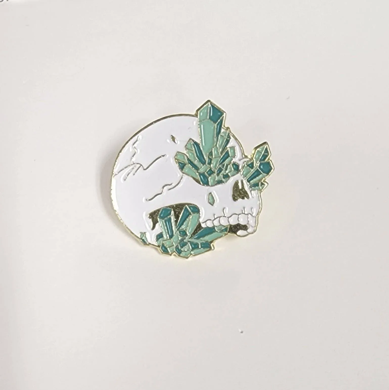 Skeleton and Green Crystal Clusters Enamel Pin